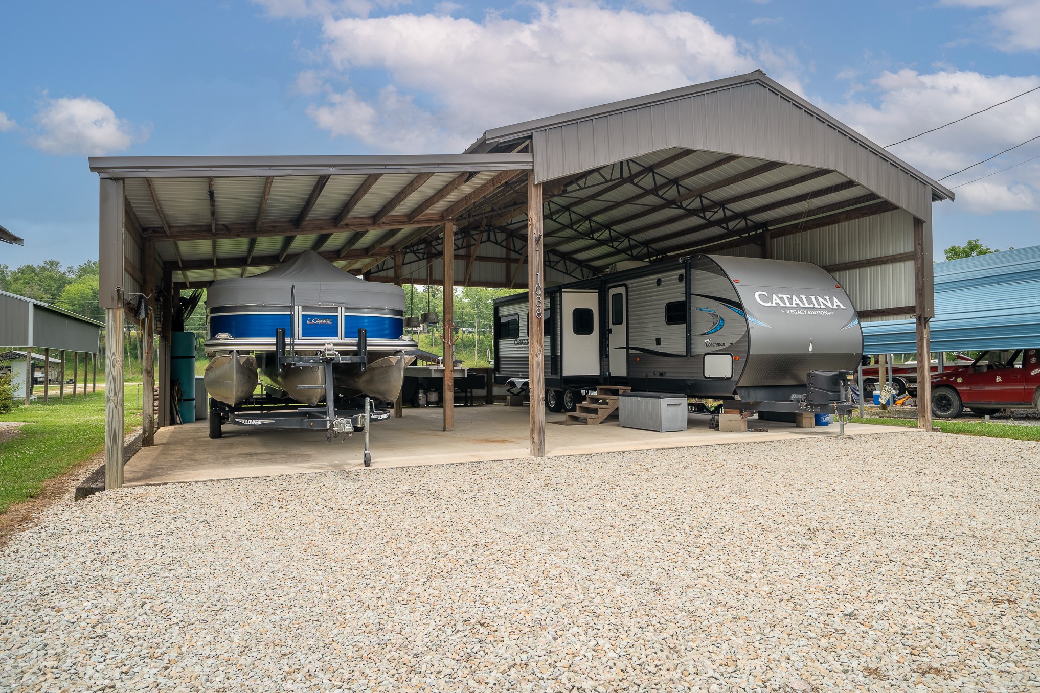 1038 WC PICKETT Road Clifton, TN 38425 - Photo 4 of 22 an empty room with wooden furniture