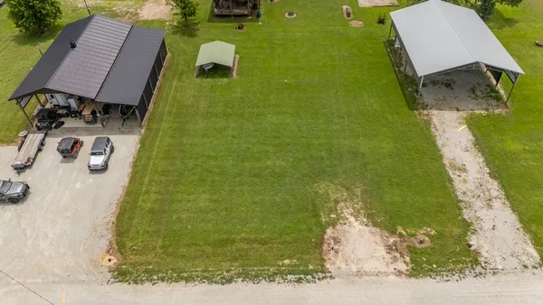 a view of a back yard of the house