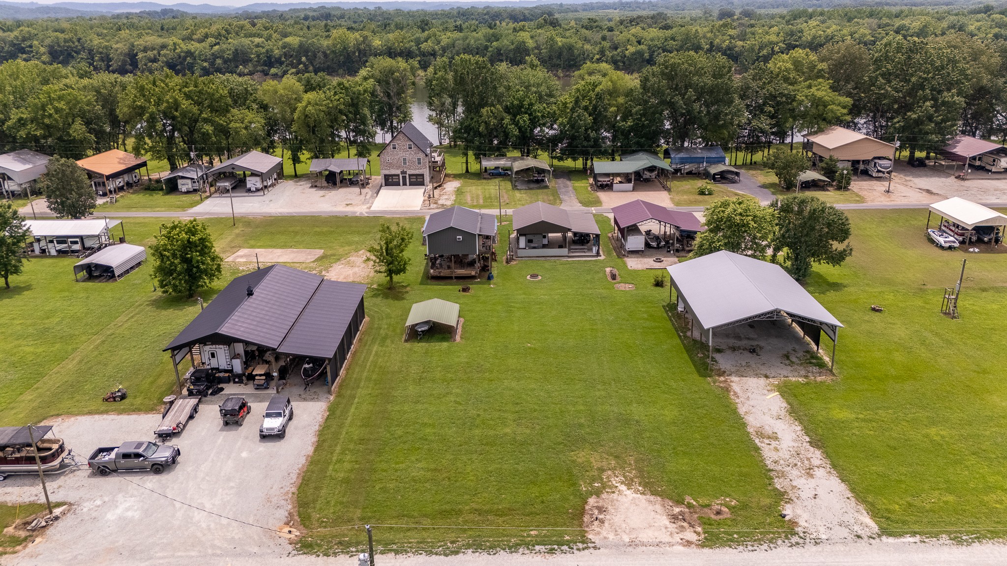 1038 WC PICKETT Road Clifton, TN 38425 - Photo 9 of 22 a view of swimming pool with outdoor seating and yard