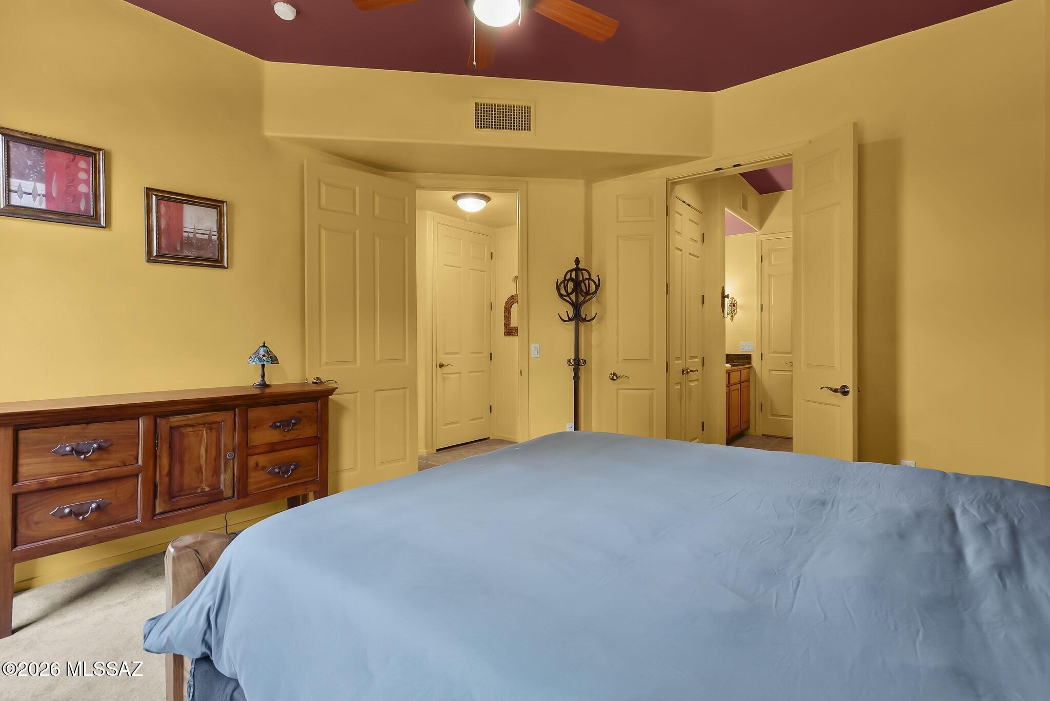 101 Post Way Tubac, AZ 85646 - Photo 15 of 31 a bedroom with a bed and a dresser