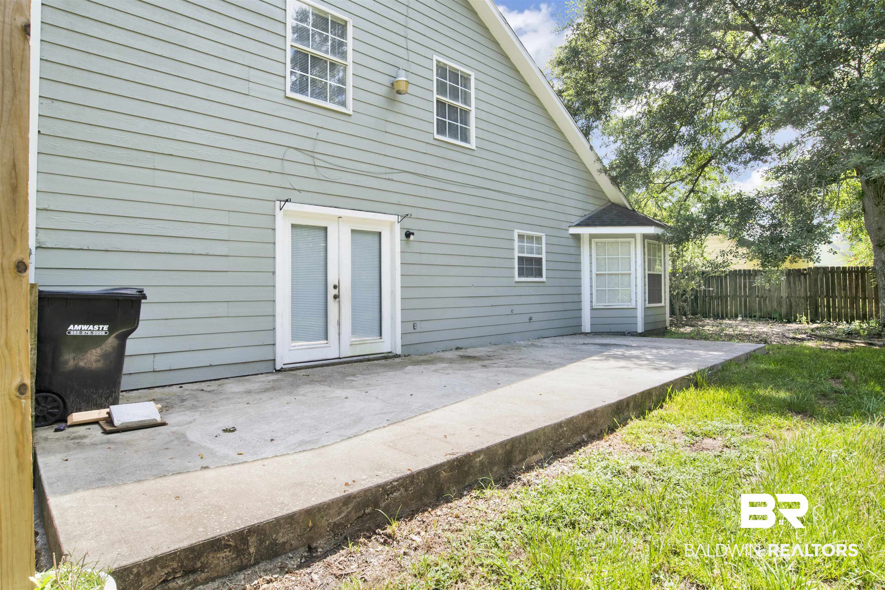 5480 Country Club Boulevard Theodore, AL 36582 - Photo 33 of 36 Back of property featuring a patio area