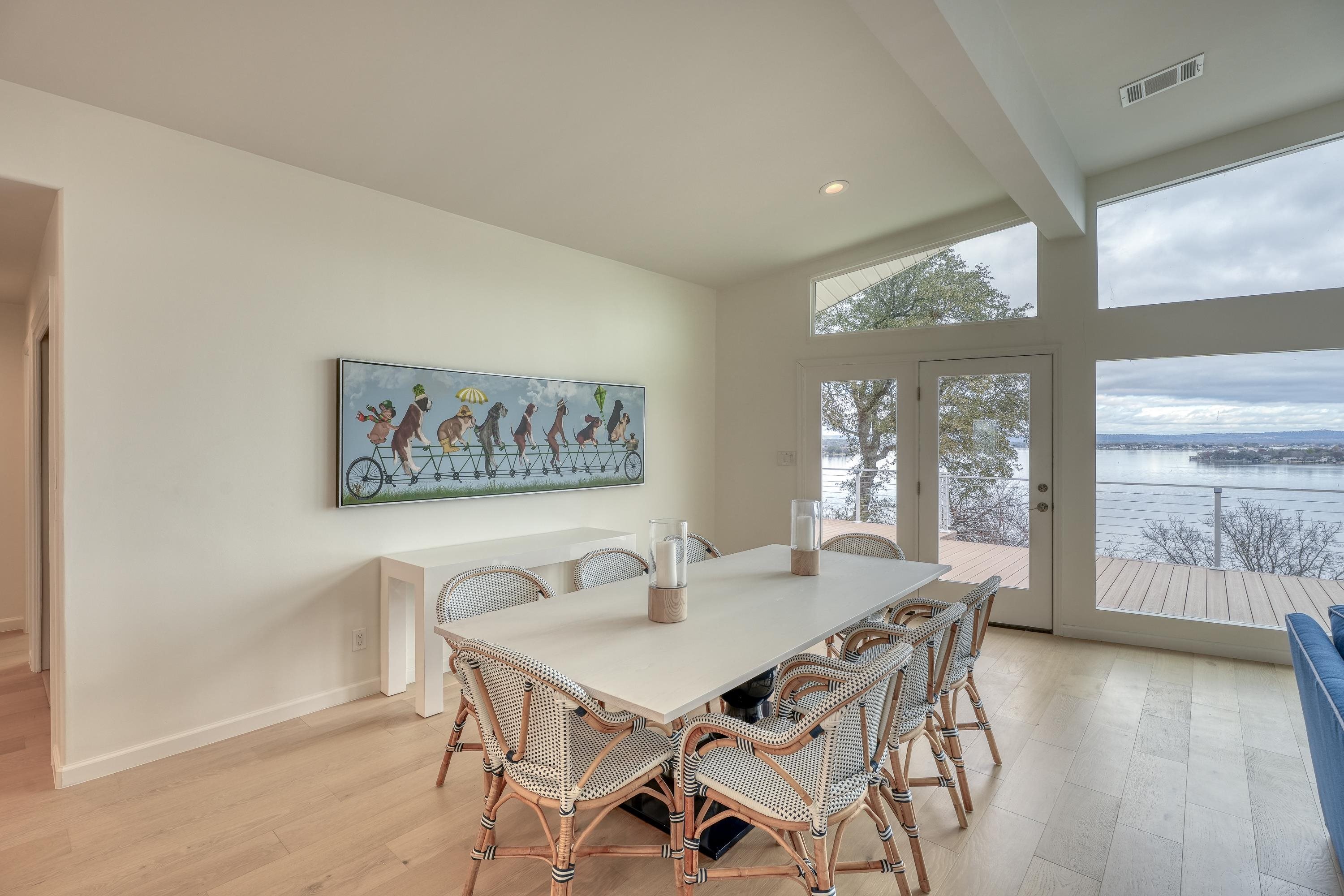 204 Blue Ridge Trail Horseshoe Bay, TX 78657 - Photo 12 of 28 a view of a dining room with furniture and wooden floor