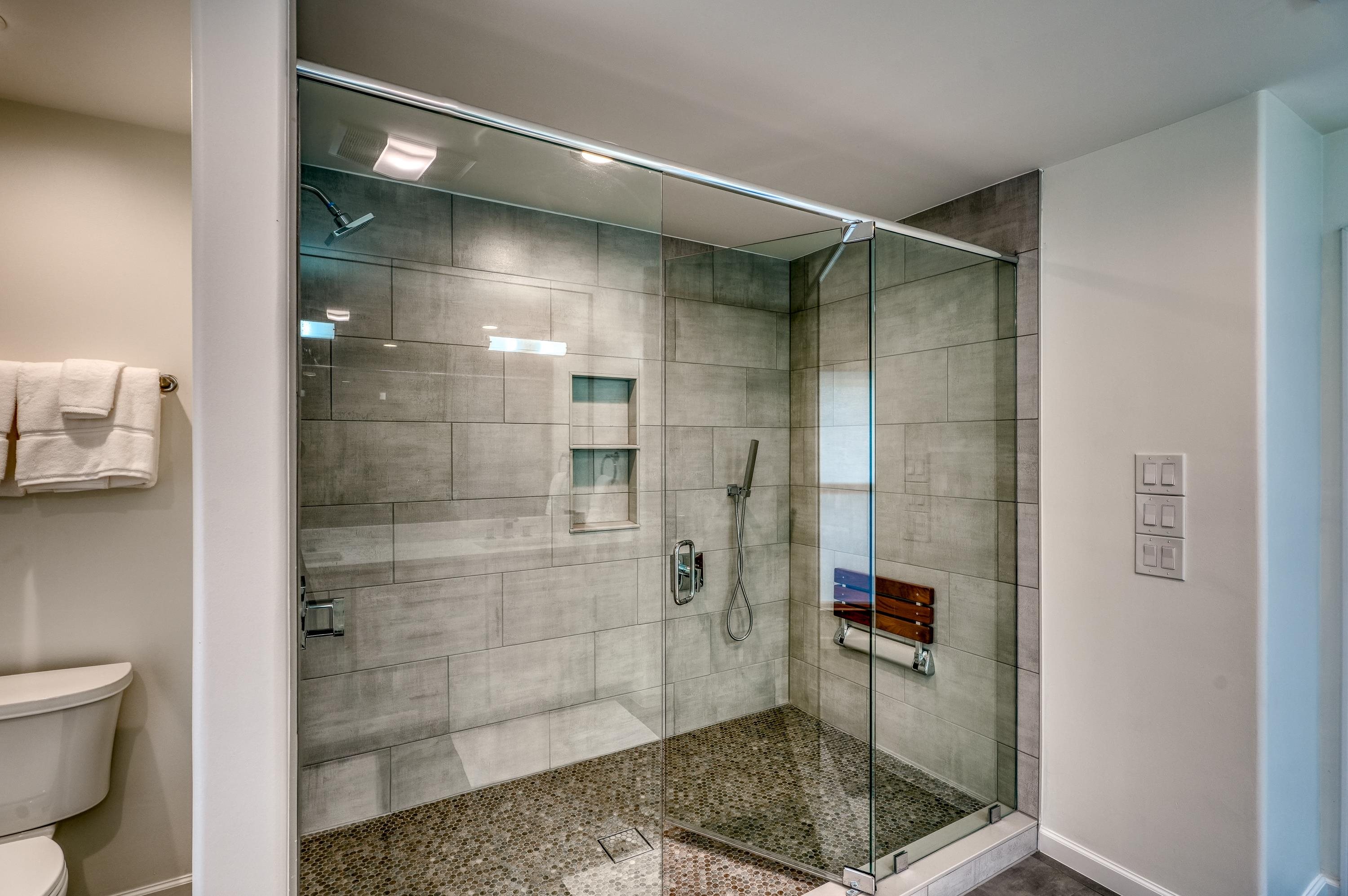 204 Blue Ridge Trail Horseshoe Bay, TX 78657 - Photo 16 of 28 a bathroom with a shower and toilet