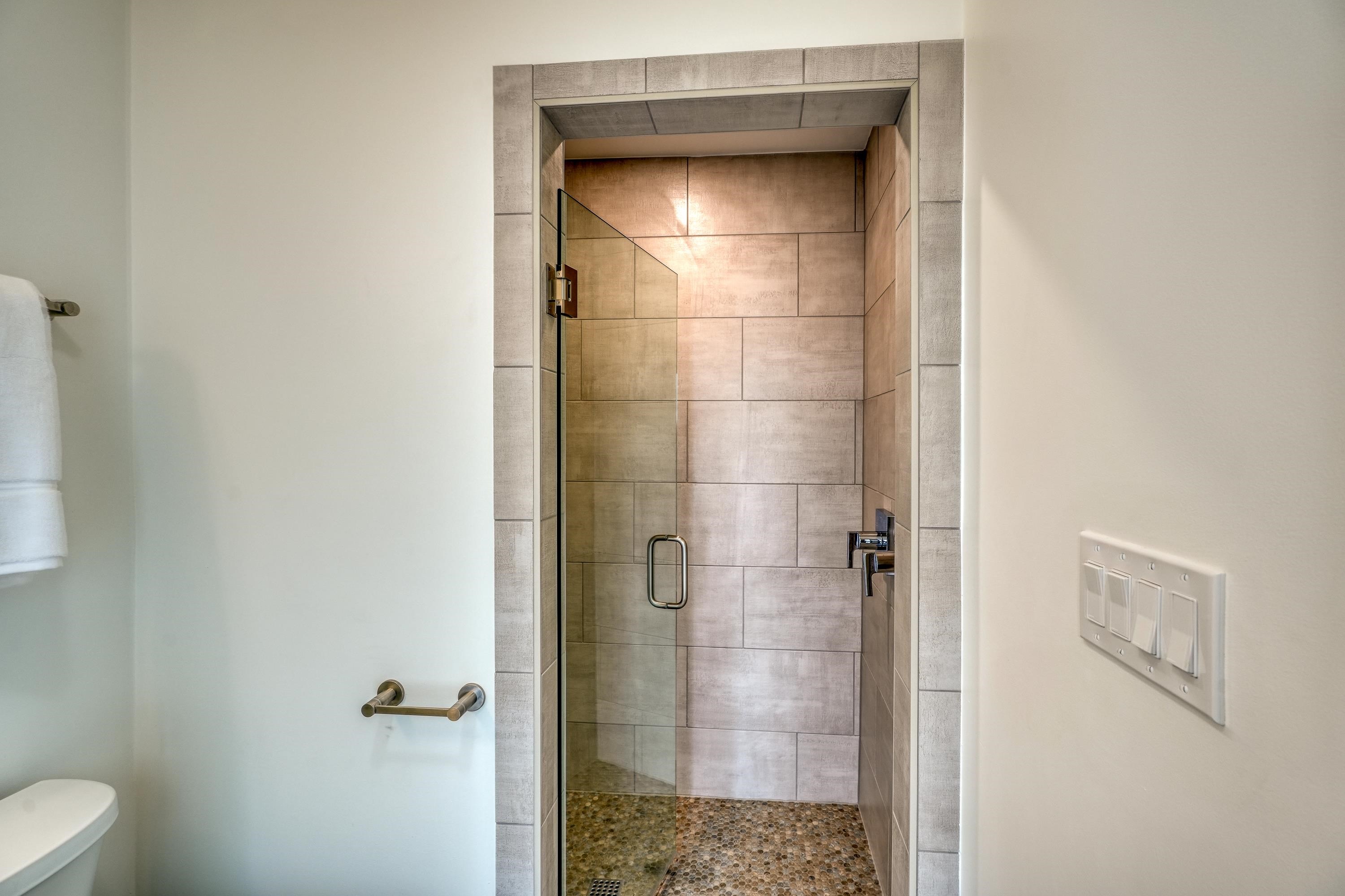 204 Blue Ridge Trail Horseshoe Bay, TX 78657 - Photo 19 of 28 a bathroom with a shower and a toilet