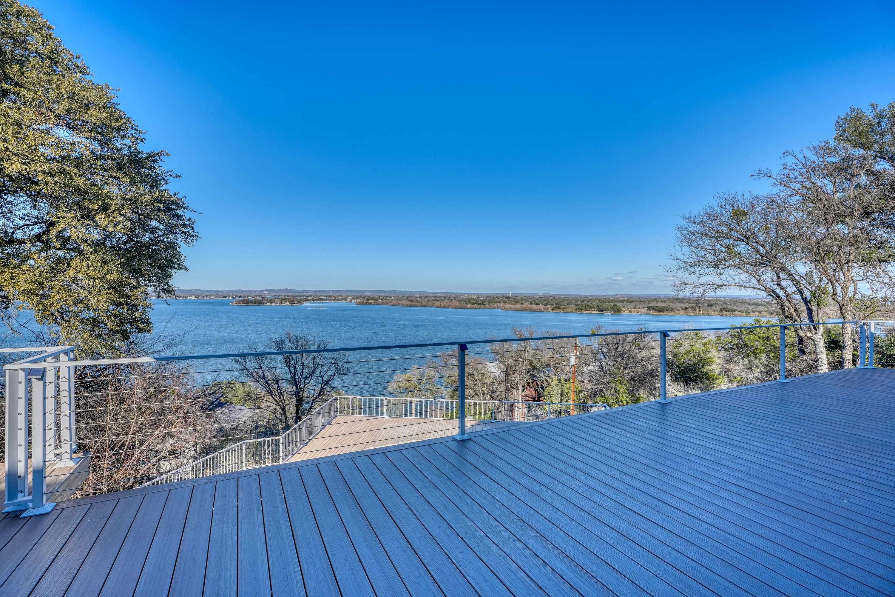 204 Blue Ridge Trail Horseshoe Bay, TX 78657 - Photo 22 of 28 a view of outdoor space with wooden deck and lake view