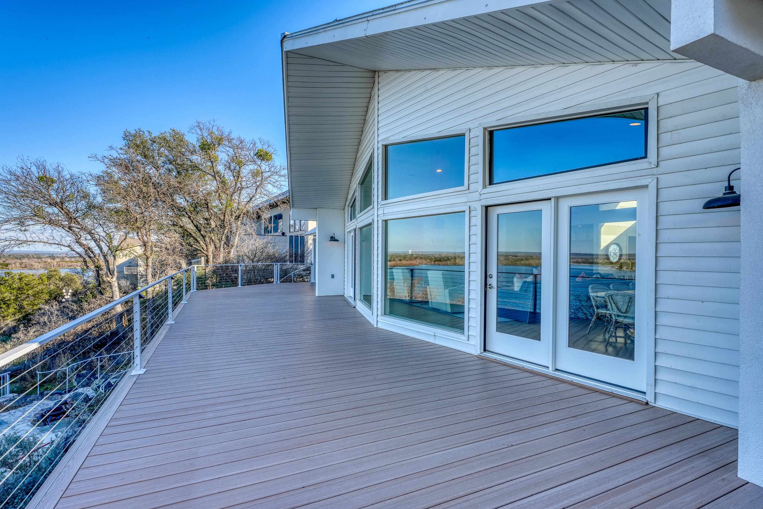 204 Blue Ridge Trail Horseshoe Bay, TX 78657 - Photo 23 of 28 a view of a house with a backyard