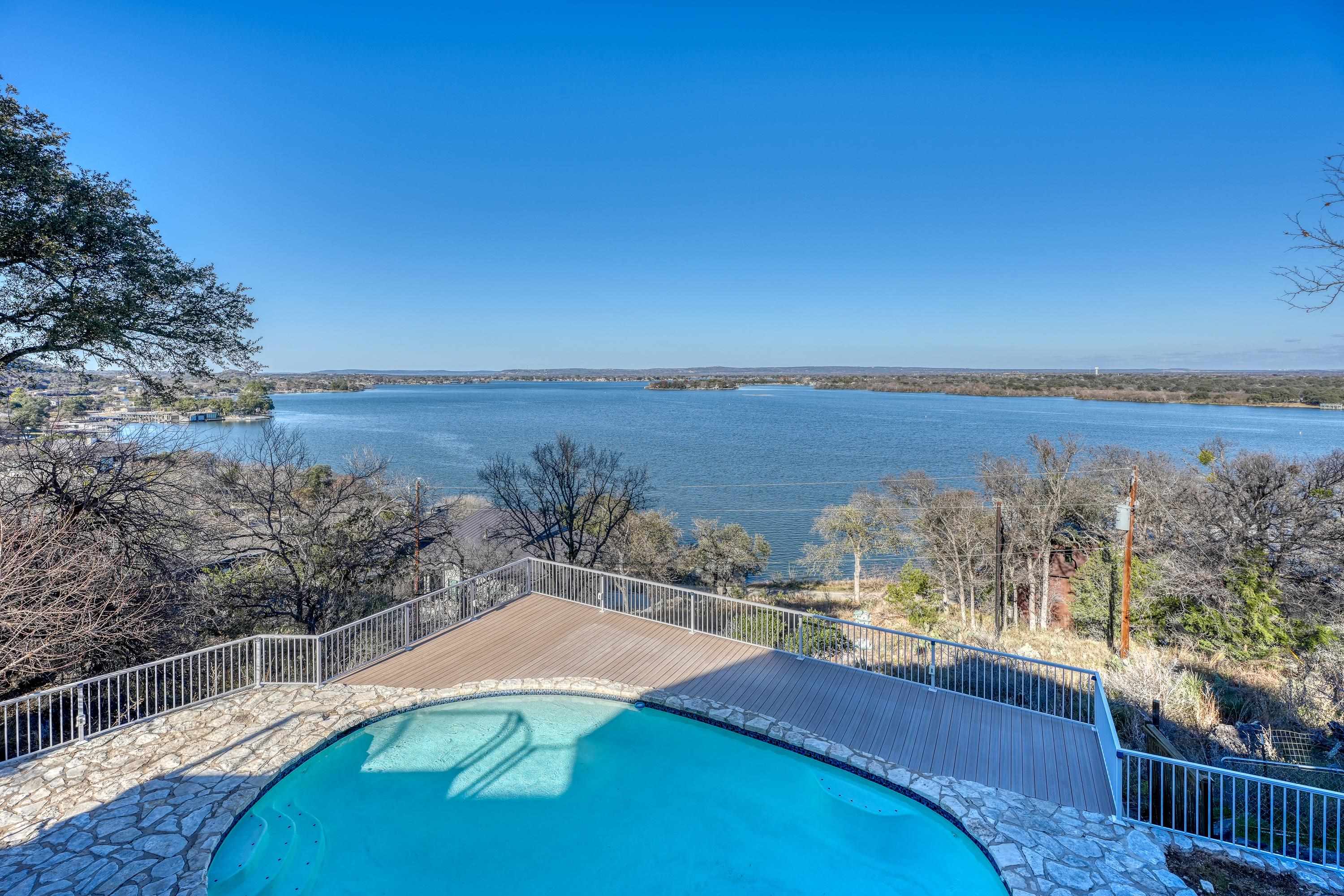 204 Blue Ridge Trail Horseshoe Bay, TX 78657 - Photo 25 of 28 a view of a balcony with an ocean