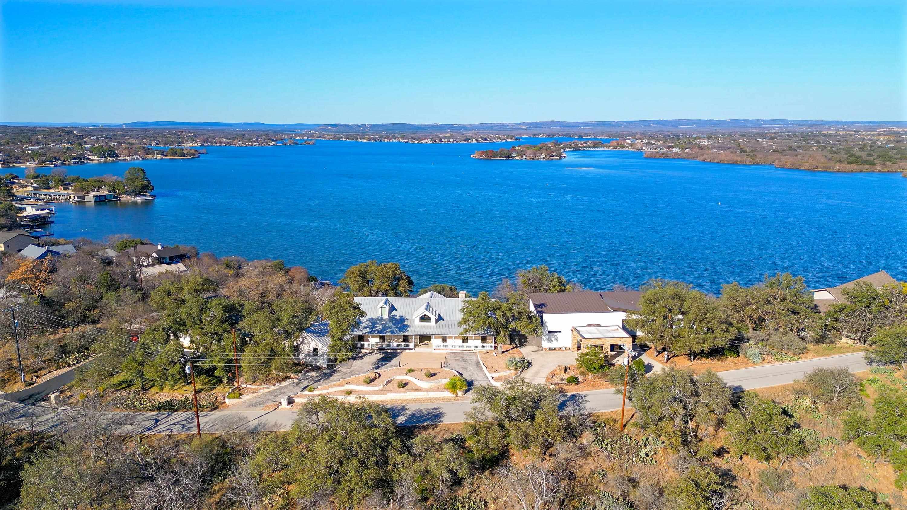 204 Blue Ridge Trail Horseshoe Bay, TX 78657 - Photo 28 of 28 an aerial view of ocean and residential houses with outdoor space