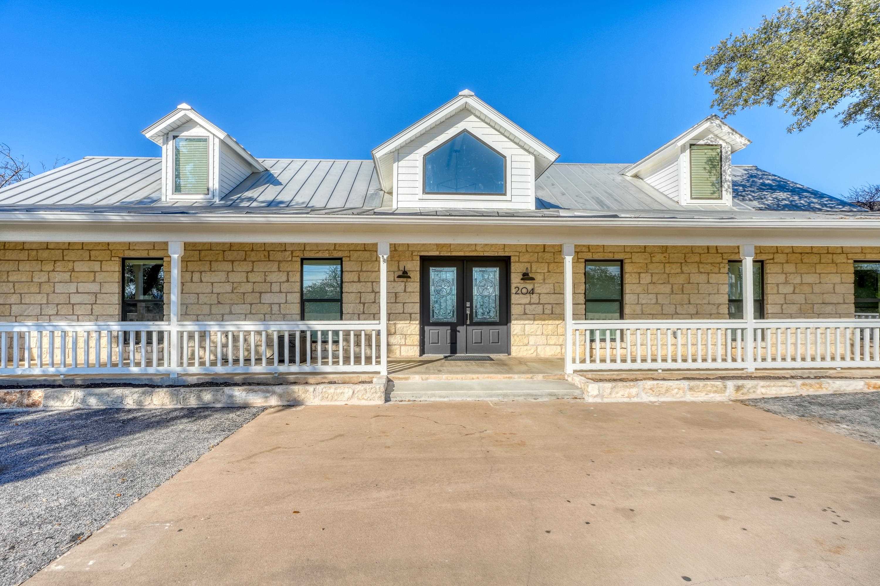 204 Blue Ridge Trail Horseshoe Bay, TX 78657 - Photo 3 of 28 front view of a house