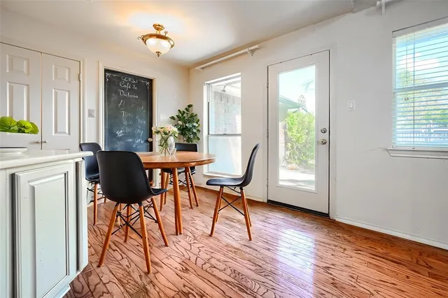 a work room with furniture and a window