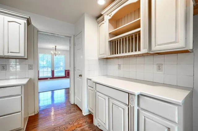 a bedroom with bed and window