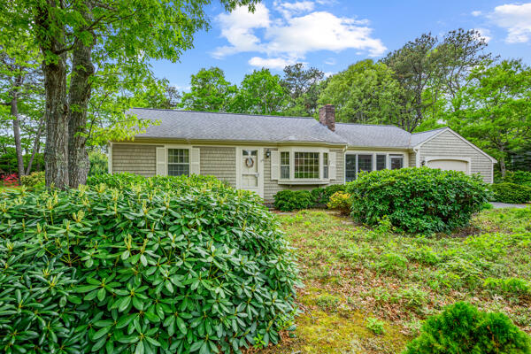 59 Beverly Road West Yarmouth, MA 02673 - Photo 6 of 33 a house view with a garden space
