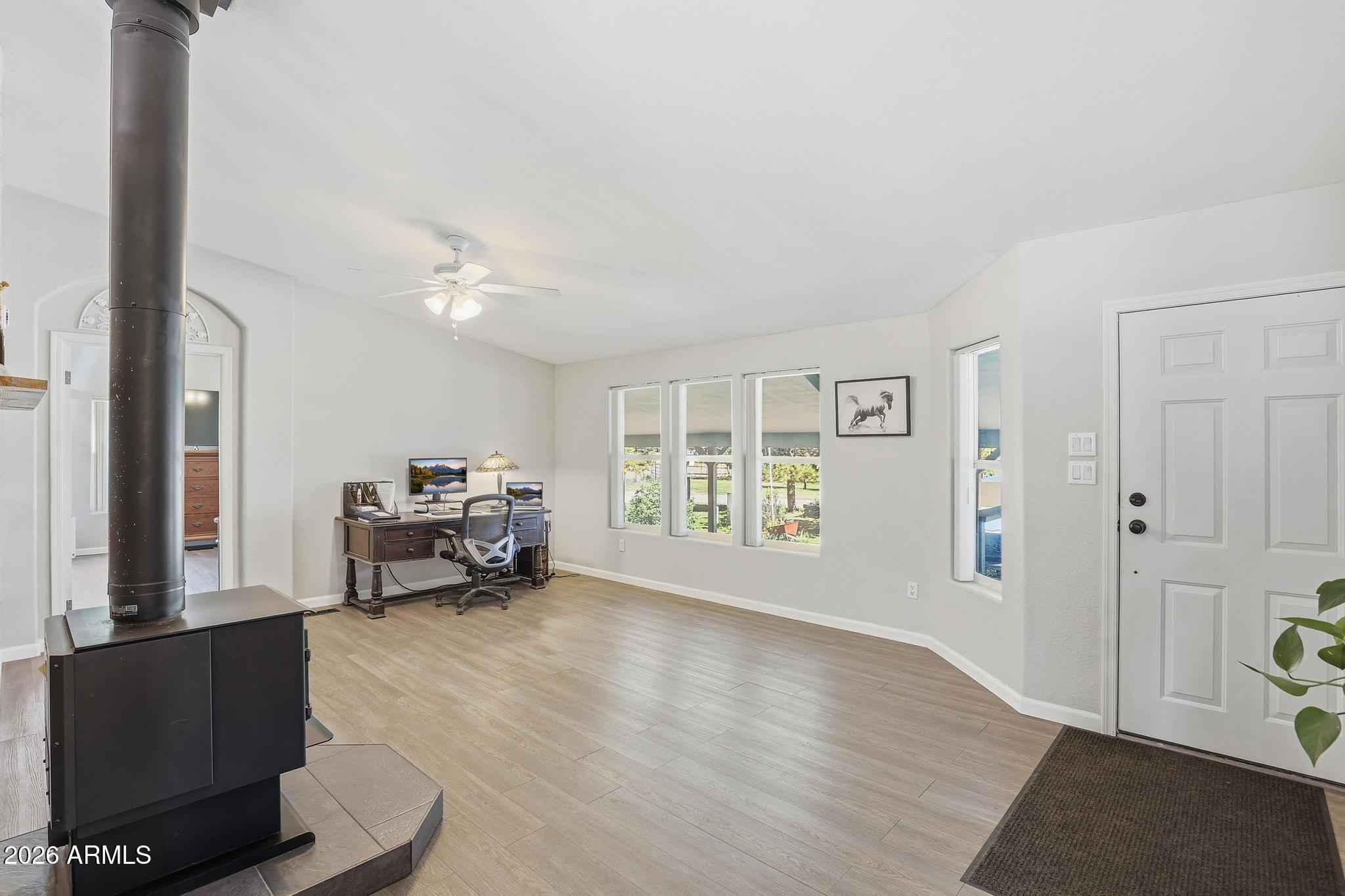 191 Cornerstone Way Payson, AZ 85541 - Photo 7 of 37 a view of livingroom with furniture and workspace