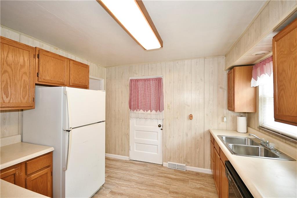 1191 Mifflin Road Pittsburgh, PA 15207 - Photo 12 of 28 The Kitchen is equipped with a Gas Stove, Microwave, Dishwasher and Refrigerator.