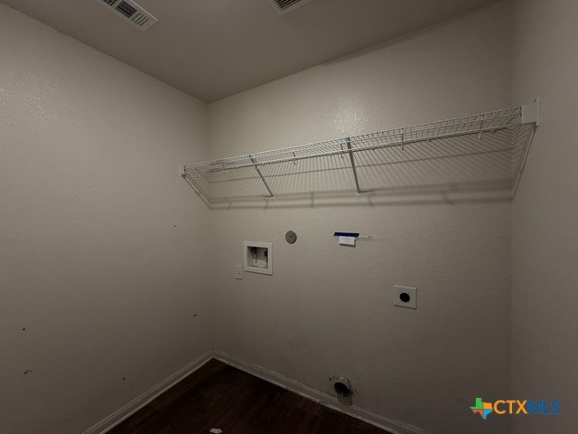 124 Niven Path Jarrell, TX 76537 - Photo 13 of 13 a view of a room with racks on the wall