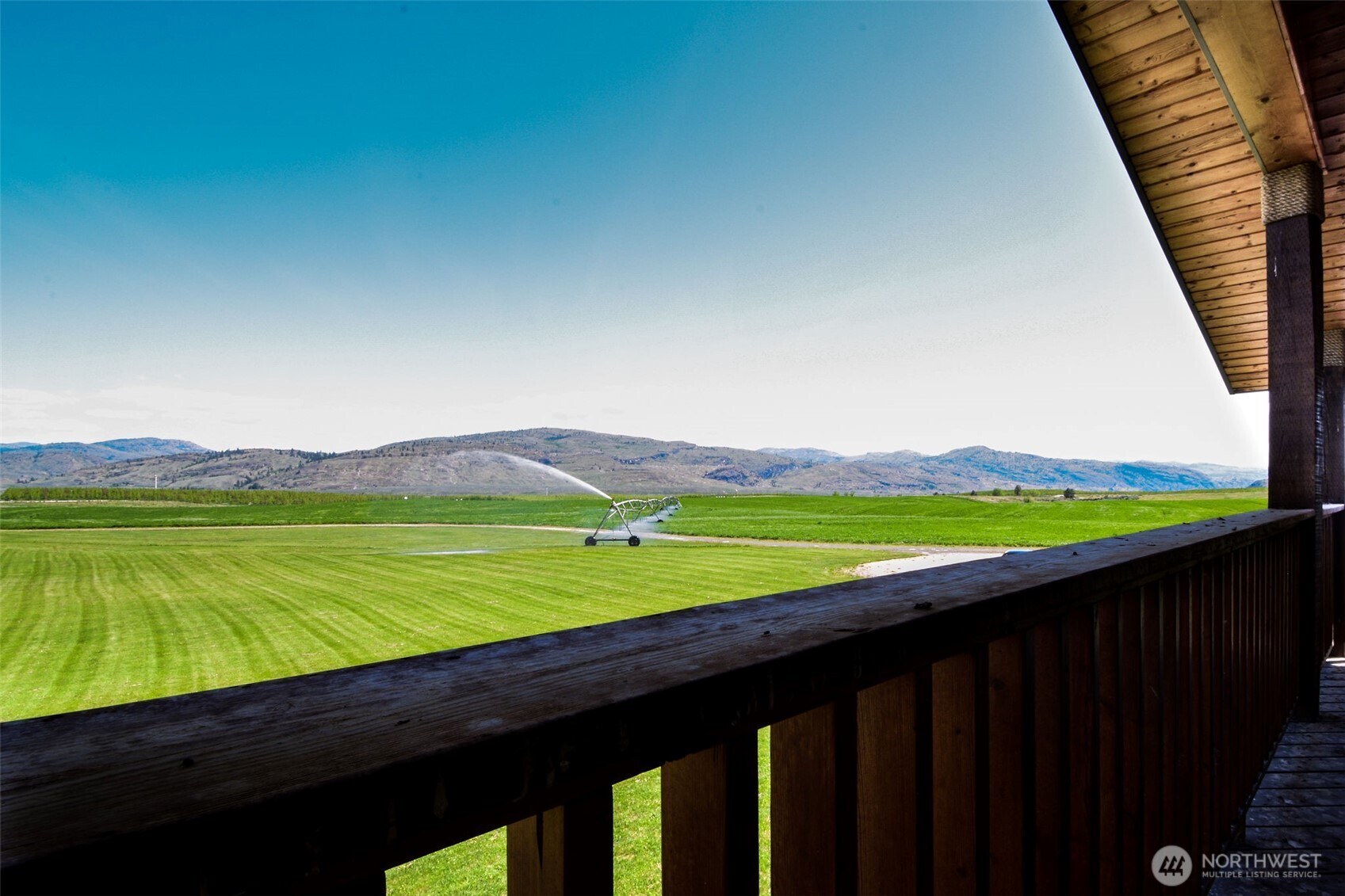 2034 North Pine Creek Road Tonasket, WA 98855 - Photo 16 of 38 a view of an ocean from a balcony