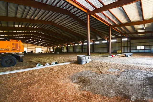 a view of a street next to a yard