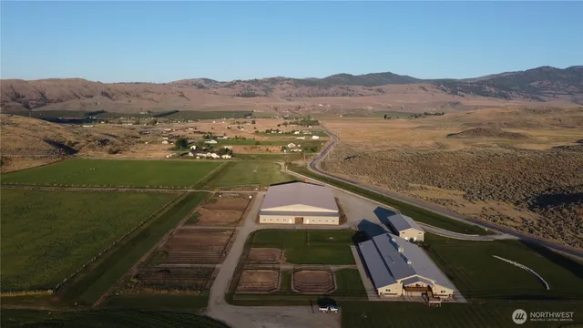a view of a mountain with an ocean