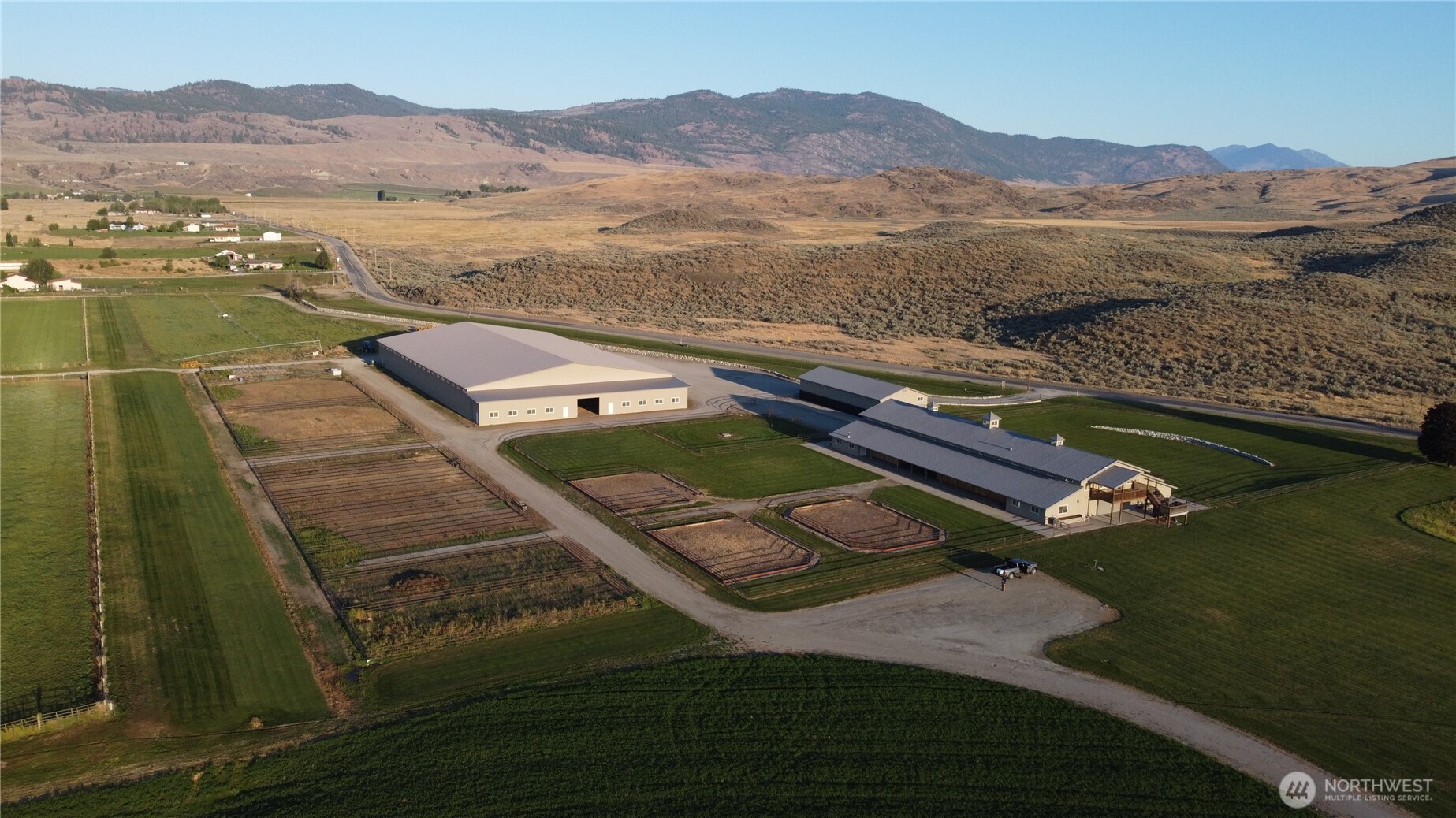 2034 North Pine Creek Road Tonasket, WA 98855 - Photo 6 of 38 a view of a mountain with an ocean