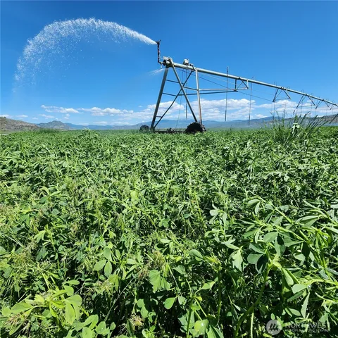 a view of an empty room with wooden walls