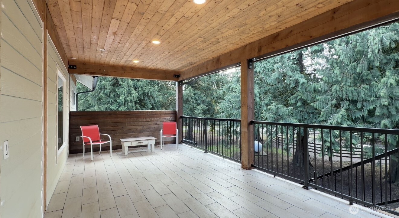 8349 Birdsview Meadows Lane Concrete, WA 98237 - Photo 27 of 38 a view of a patio with wooden floor
