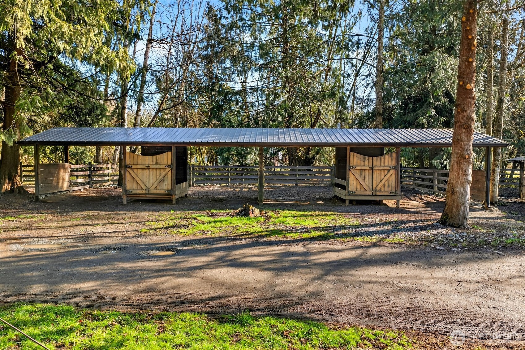 8349 Birdsview Meadows Lane Concrete, WA 98237 - Photo 32 of 38 a view of a backyard with wooden fence