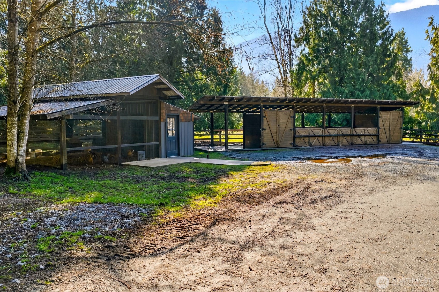 8349 Birdsview Meadows Lane Concrete, WA 98237 - Photo 33 of 38 a view of a house with backyard and porch