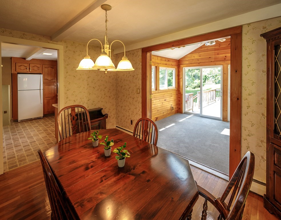 182 Wayside Inn Road Sudbury, MA 01776 - Photo 12 of 42 a view of a dining room with furniture window and wooden floor