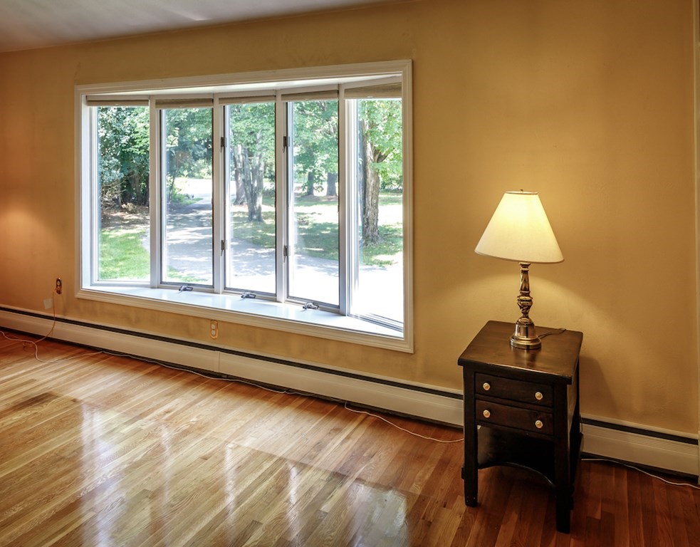 182 Wayside Inn Road Sudbury, MA 01776 - Photo 19 of 42 a view of a workspace with furniture and a window