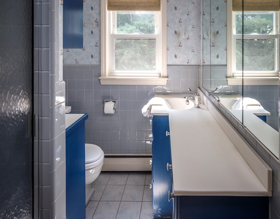 182 Wayside Inn Road Sudbury, MA 01776 - Photo 22 of 42 a bathroom with a sink a toilet and a bathtub
