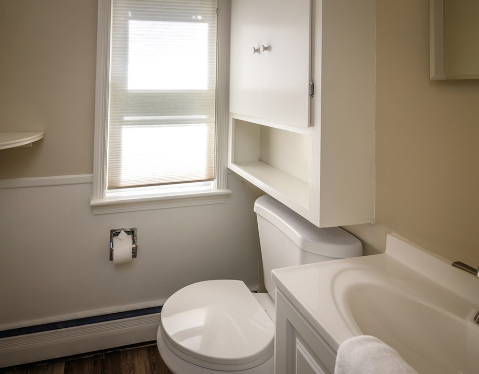 182 Wayside Inn Road Sudbury, MA 01776 - Photo 28 of 42 a white toilet sitting next to a window