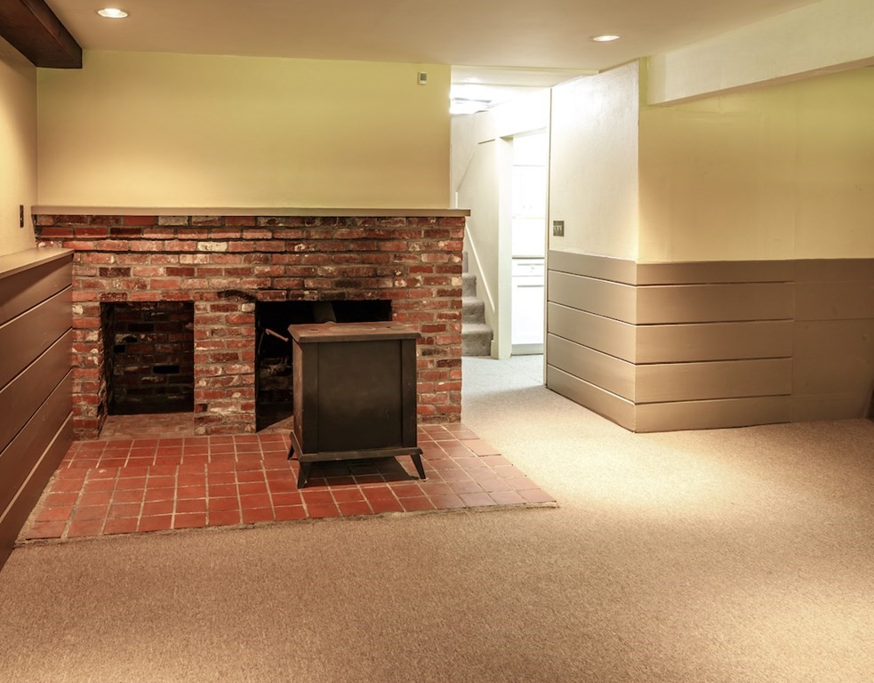 182 Wayside Inn Road Sudbury, MA 01776 - Photo 35 of 42 a room with a fireplace