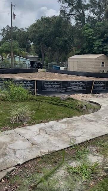 6120 Waverly Road Weeki Wachee, FL 34607 - Photo 2 of 4 a view of a backyard with swimming pool