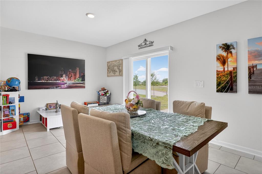 545 Bell Prairie Circle Lake Wales, FL 33859 - Photo 13 of 42 a living room with furniture and a flat screen tv