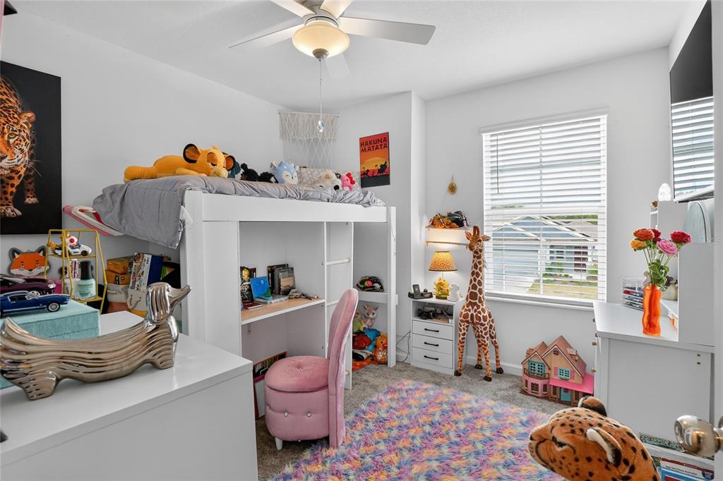 545 Bell Prairie Circle Lake Wales, FL 33859 - Photo 25 of 42 a living room with furniture and a window