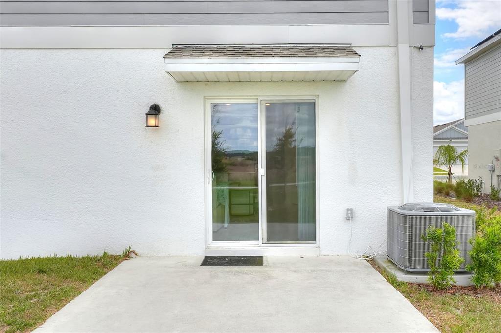 545 Bell Prairie Circle Lake Wales, FL 33859 - Photo 30 of 42 a view of a entrance door of the house
