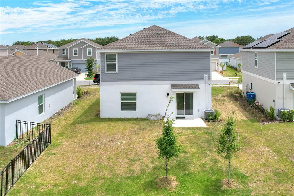 545 Bell Prairie Circle Lake Wales, FL 33859 - Photo 38 of 42 front view of a house with a yard