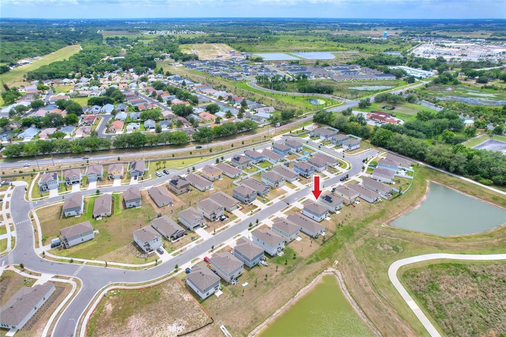 545 Bell Prairie Circle Lake Wales, FL 33859 - Photo 39 of 42 an aerial view of residential houses with outdoor space