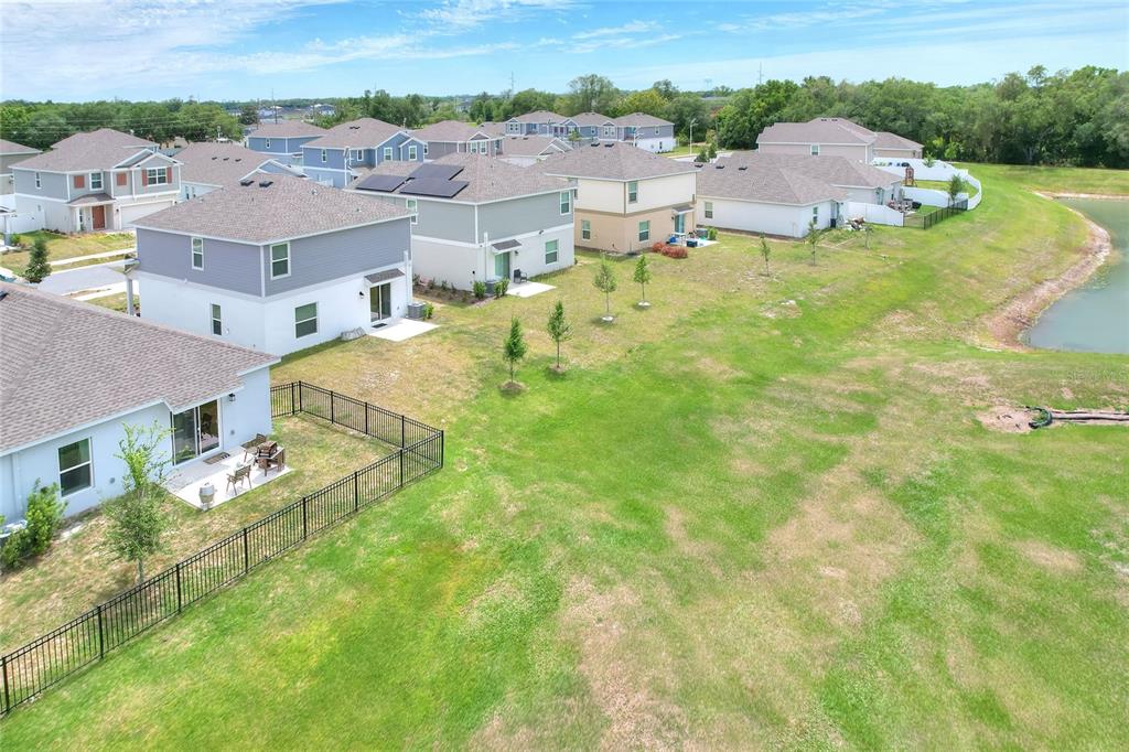 545 Bell Prairie Circle Lake Wales, FL 33859 - Photo 40 of 42 an aerial view of residential houses with outdoor space and trees
