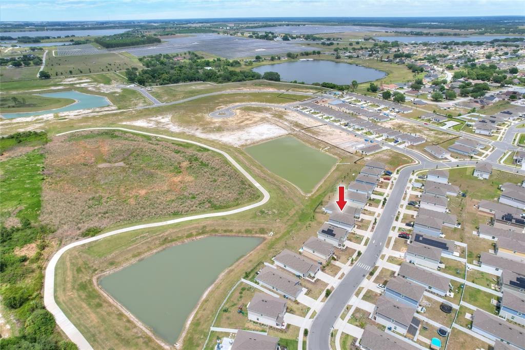 545 Bell Prairie Circle Lake Wales, FL 33859 - Photo 41 of 42 an aerial view of residential houses with outdoor space