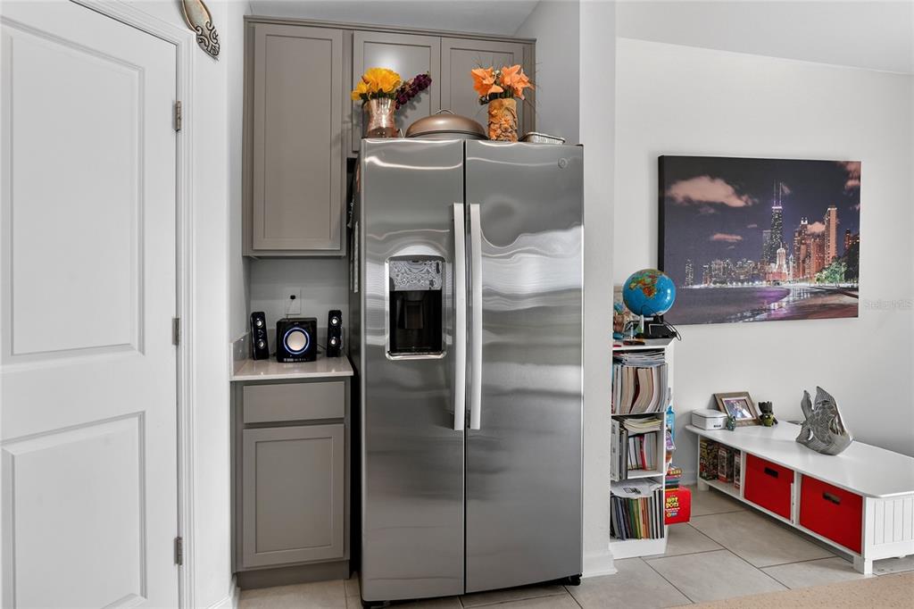 545 Bell Prairie Circle Lake Wales, FL 33859 - Photo 10 of 42 a kitchen with stainless steel appliances granite countertop a refrigerator and a sink