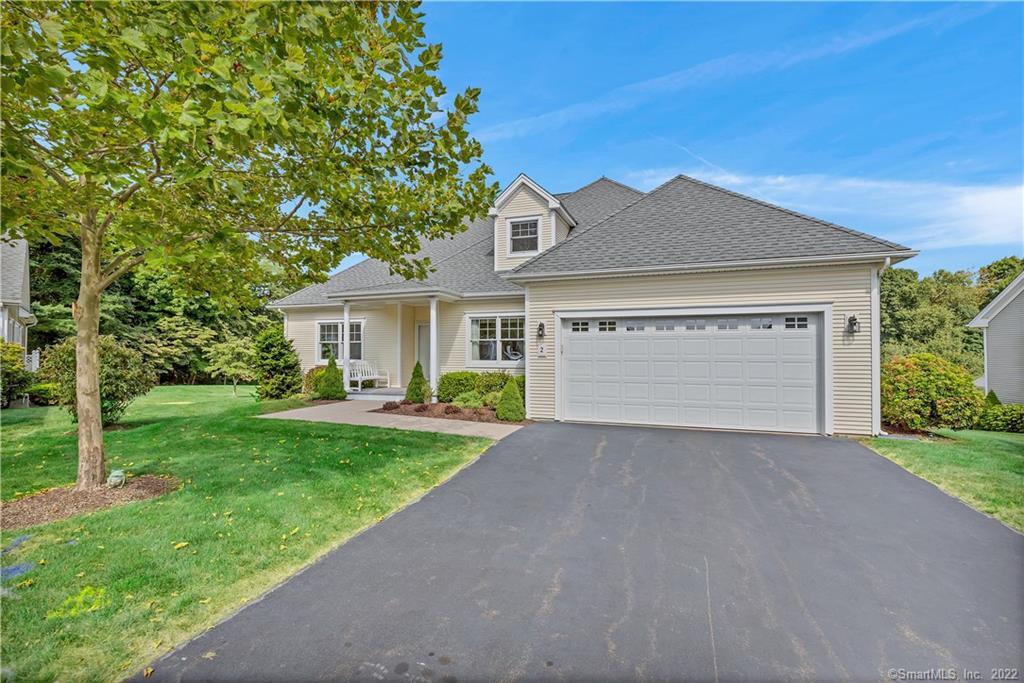 2 Barn Way, Unit 2 Westbrook, CT 06498 - Photo 1 of 1 a view of a house with a yard and large tree