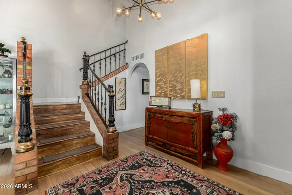 a bedroom with furniture and window