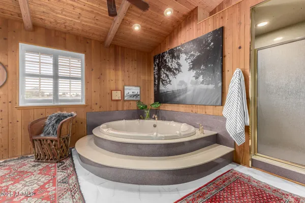 a living room with a couch and a rug