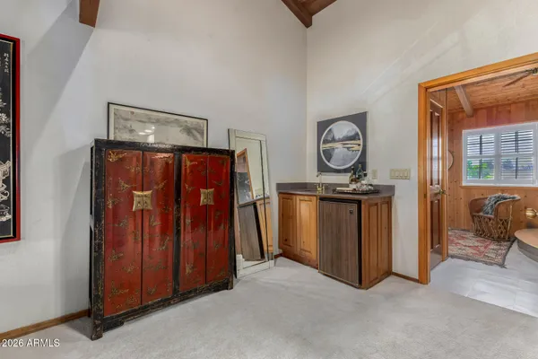 a living room with couch and a table