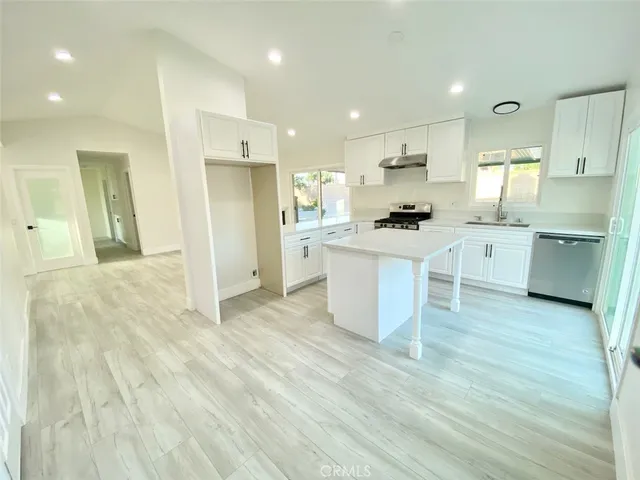 a view of a glass door and a window