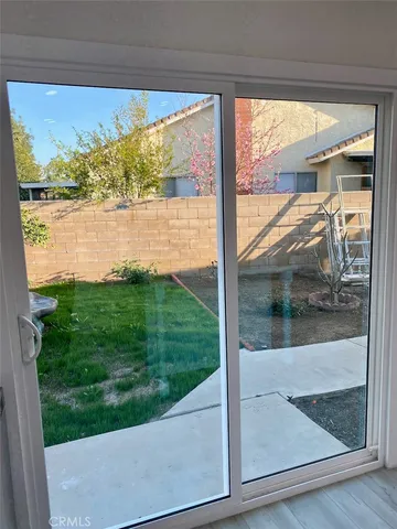 a view of a glass door with a door