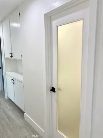 a bathroom with a toilet and a bathtub