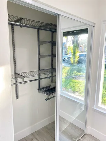 a view of a backyard with sitting area