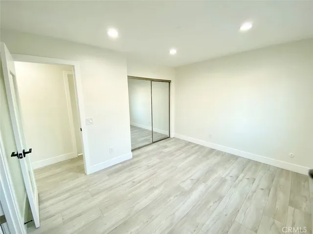 a front view of a house with a yard and porch